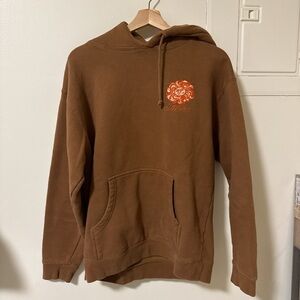 Others Follow Chestnut Hoodie with Vibrant Orange Graphic